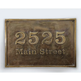 Personalize your home with a custom-engraved brass address plaque. Choose your desired size, font, and finish to create a unique and stylish statement.